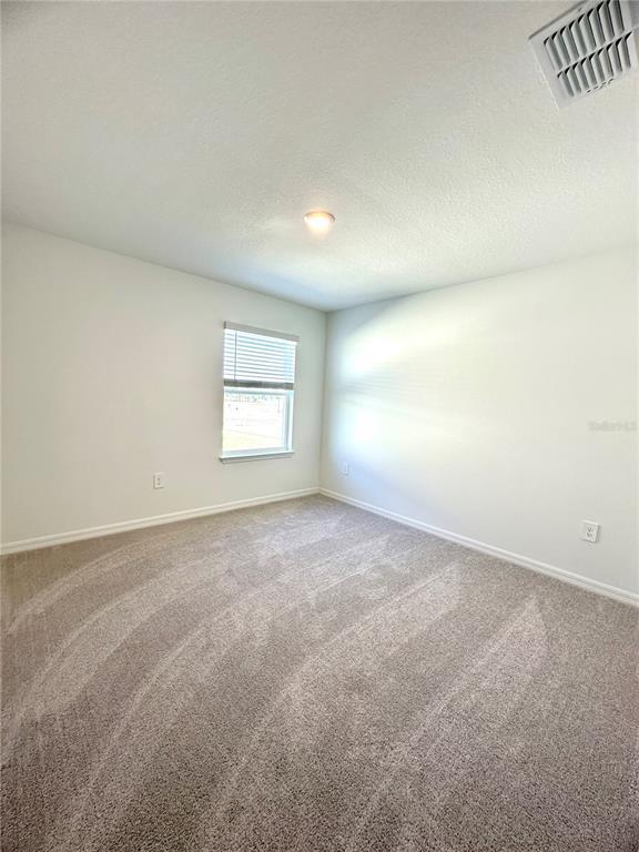 Building Photo - 8795 Coqui Song Ln