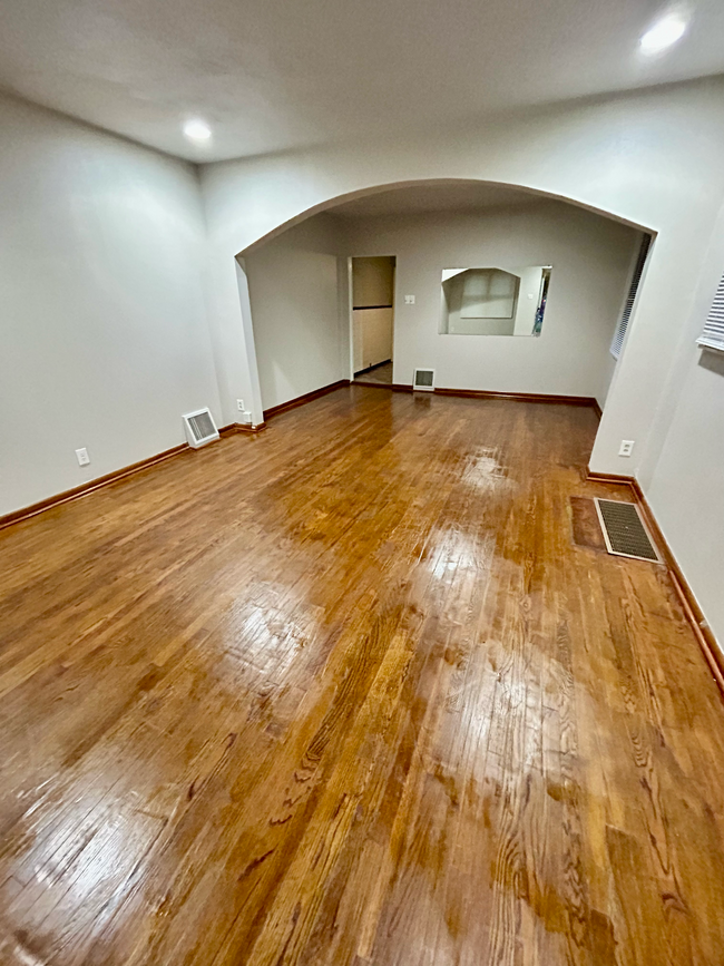 Polished wood floor - Open layout includes nook (perfect for desk) living & dining area) - 6516 Oleatha Ave