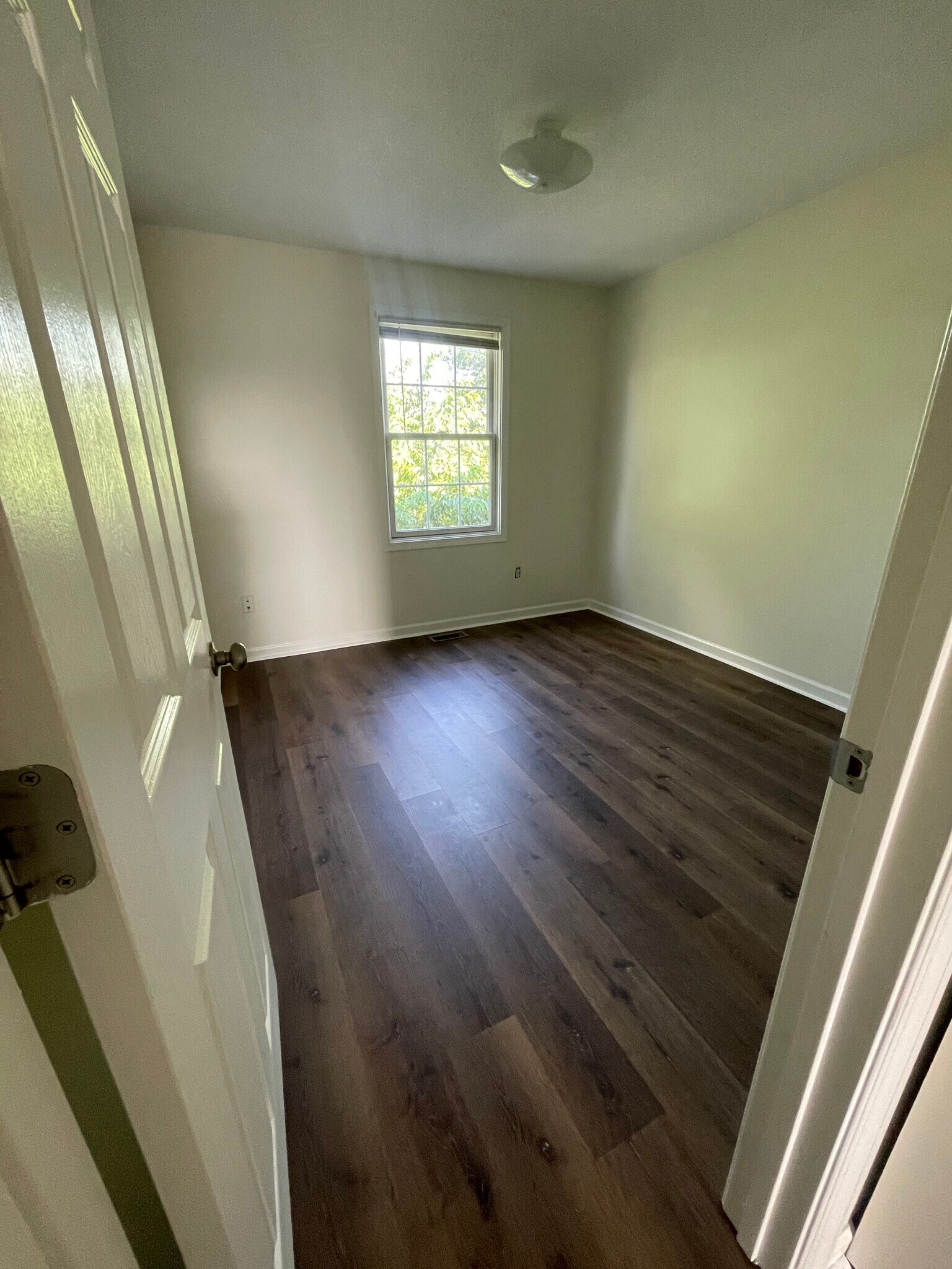 Upstairs bedroom with new flooring - 1419 Founders Way