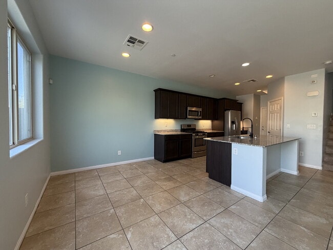 Building Photo - 4 BED 2.5 BATH 2 CAR GARAGE SINGLE FAMILY HOME W/ FULLY LANDSCAPED BACKYARD. THIS WAS FORMER MODE...