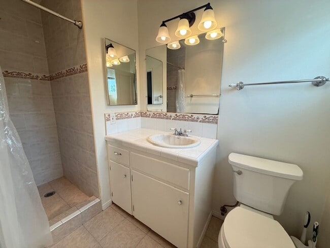 Building Photo - College View Estates Gem – Spacious 3BR Home with Private Yard & RV Parking