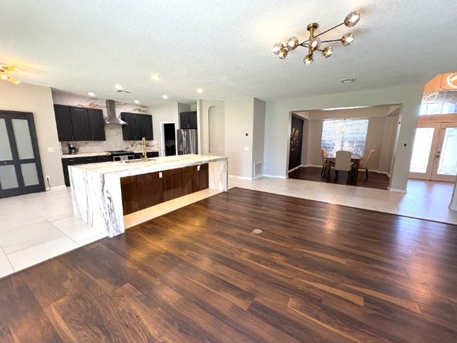 Building Photo - Available NOW!  Stunning 5-Bedroom Home in Gated Avalon Lakes Community