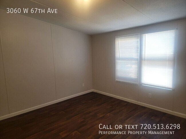 Building Photo - 3060 W 67th Ave
