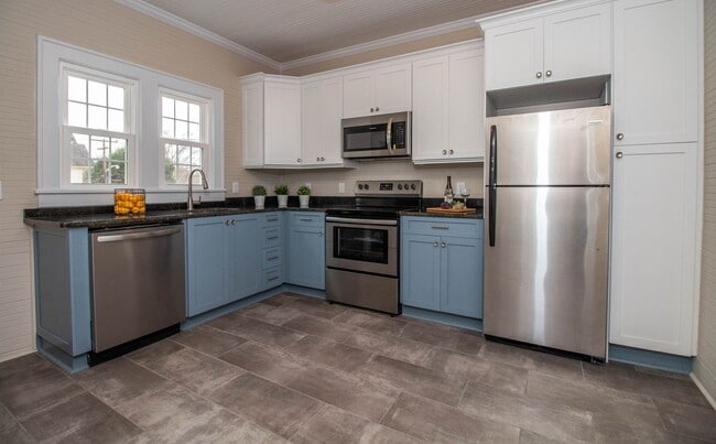 Building Photo - Exclusively Offered By Muse Realty Rentals, LLC