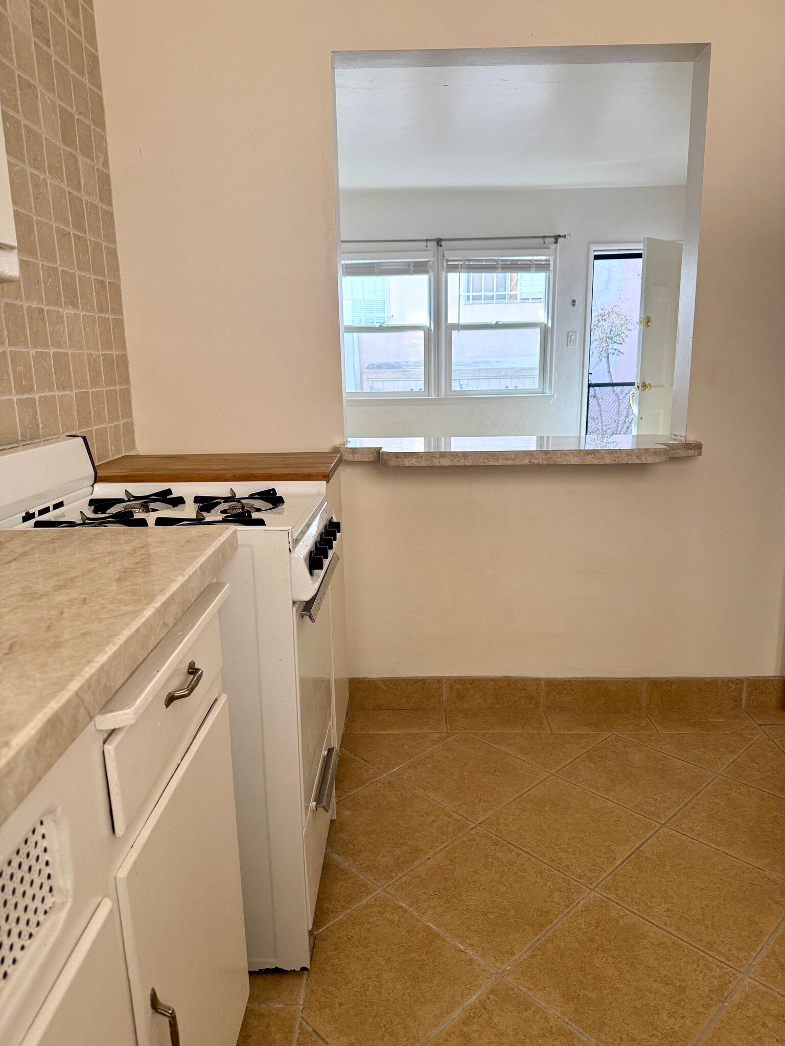 Kitchen toward Living Area - 150 Pomona Ave