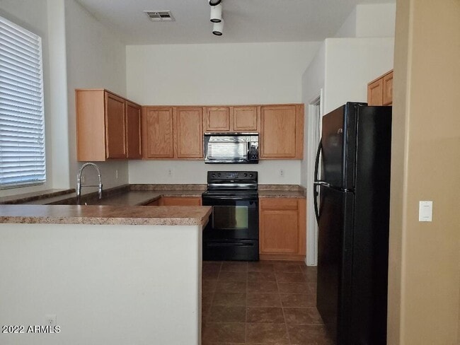 Building Photo - 1176 W Fruit Tree Ln