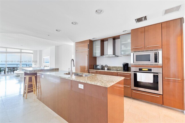Building Photo - 3801 Collins Ave