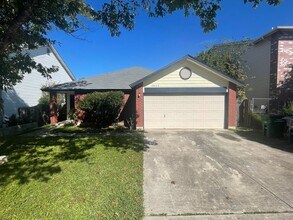 Building Photo - NICE 3 BEDROOM FEATURING AN ISLAND KITCHEN...