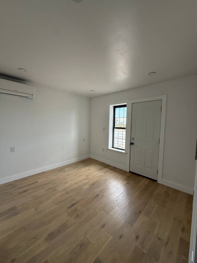 Building Photo - 57-69-69 79th St