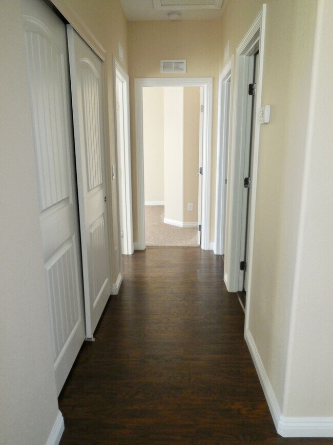 Building Photo - Spacious House w/Tons of Storage,Tile & Wo...