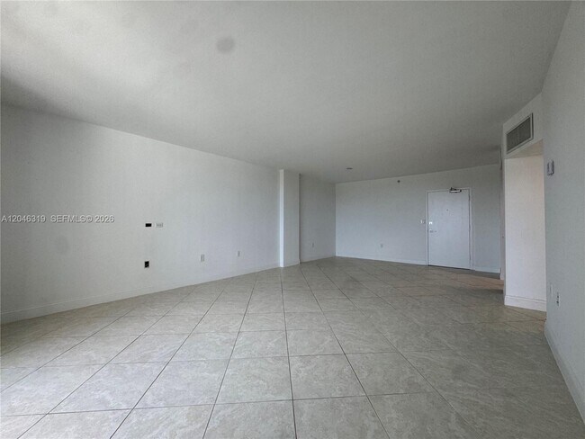 Building Photo - 10275 Collins Ave