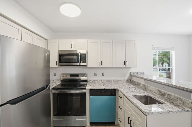 Building Photo - An inviting opportunity to make your next move truly feel like home.