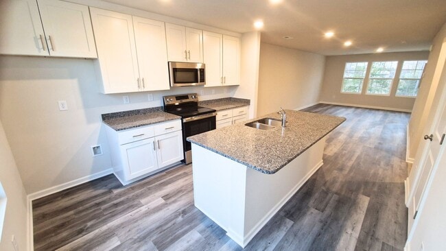 Building Photo - COMING SOON! 3BR Townhome • Brand-New Build • Garage Parking