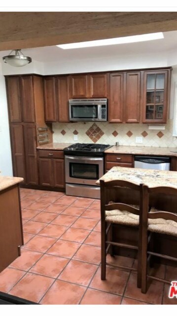 Building Photo - 4715 Camellia Ave