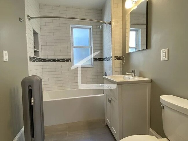 Building Photo - Washington Sq. Area, Heat, Hot Water Included, Lage Bedrooms, Eat-in Kitchen, Porch, Laundry on a...