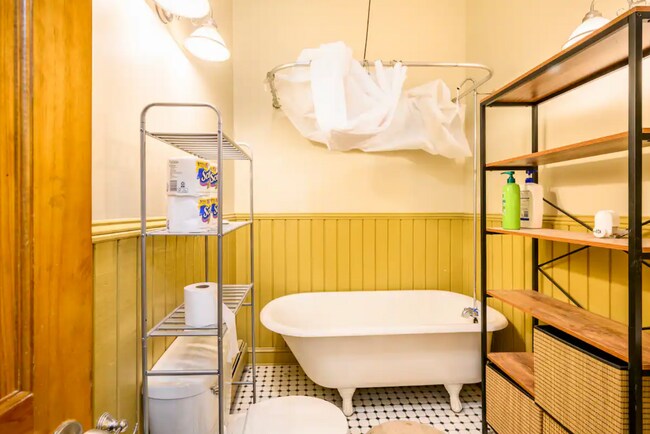 large bathroom with clawfoot tub - 134 Coles St