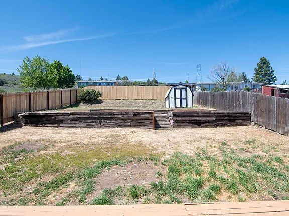 Building Photo - "Charming 5-Bed Sanctuary with Cozy Fireplace on South Rogers Street!"