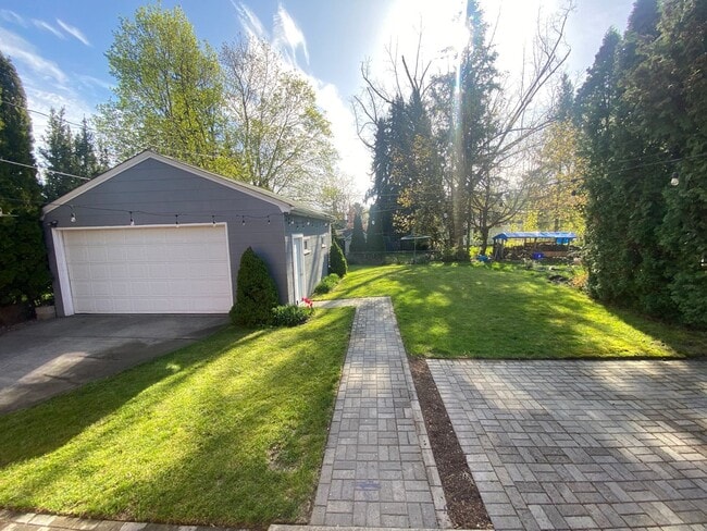 Building Photo - Perry District Gem – Move-In Ready 3 plus Bed / 2 Bath Brick Home with Finished Basement & 2-Car ...