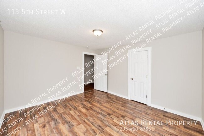 Building Photo - 115 5th St W