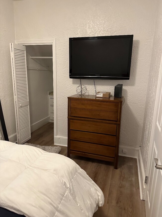 Side Bedroom with TV - 77 W Eagle St