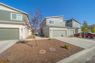 Building Photo - Upscale Townhome Haven: Designer Finishes ...