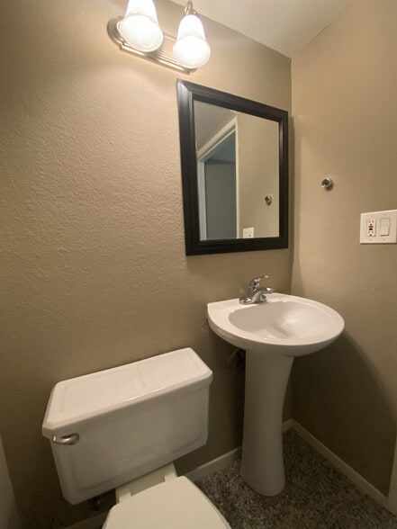 Downstairs toilet - 802 Magnolia Ave