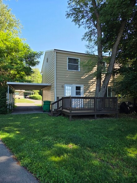 View of rear of the house with deck. - 102 Stonecrest