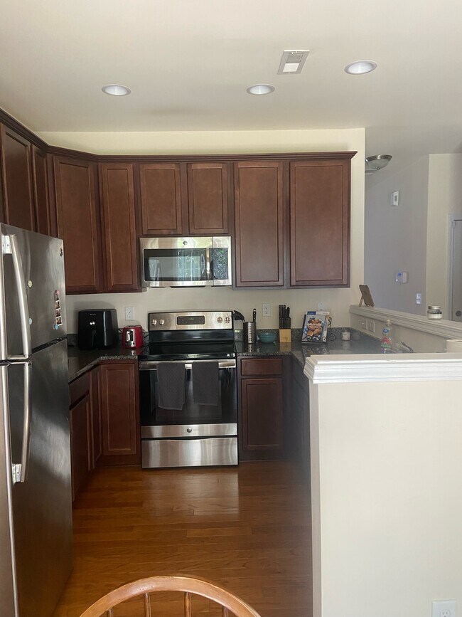 Kitchen with stainless steel appliances - 11114 Kanturk Ct