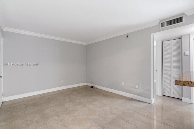 Building Photo - 241 S Royal Poinciana Blvd