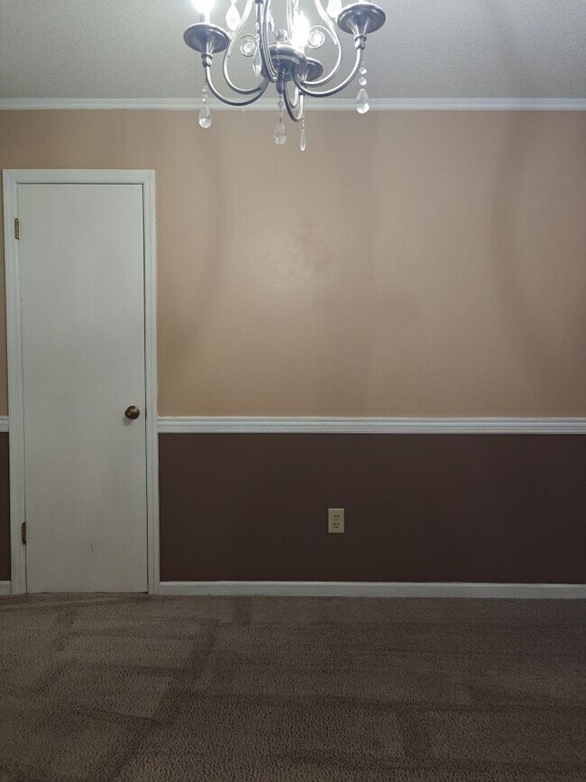 Building Photo - Elegant & Spacious 3-Bedroom Brick Home with Private Garage