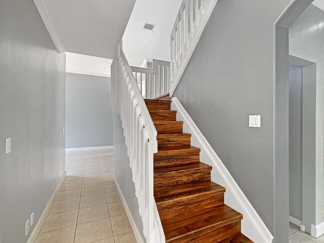 Building Photo - Beautiful 4BR Home in Gated Wellington Shores | Fenced Yard | Resort-Style Amenities
