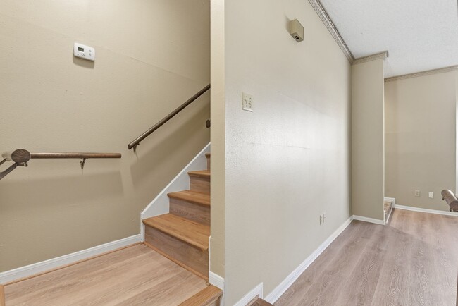 Building Photo - Come see this charming 2-story condo featuring 2 bedrooms and 2.5 bathrooms!