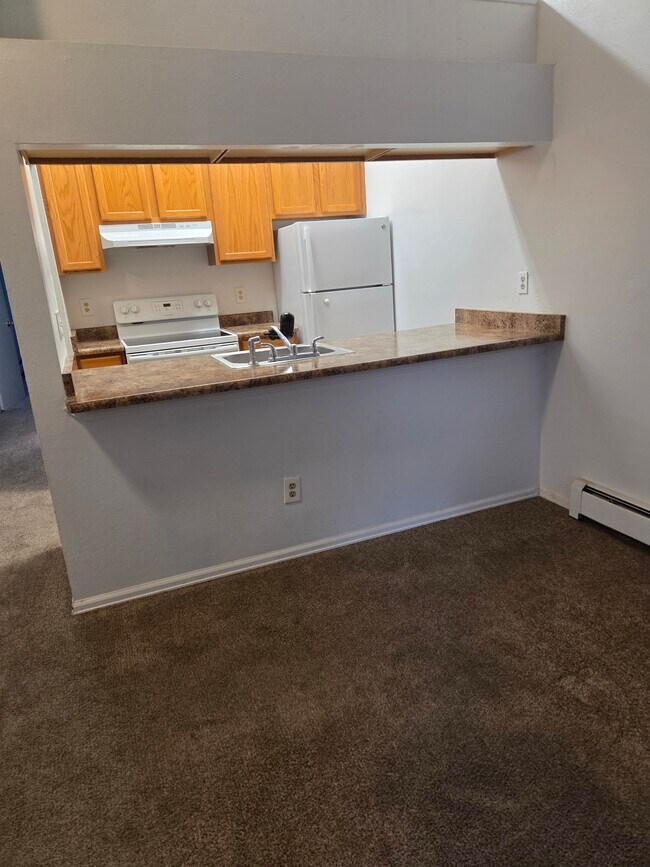 Building Photo - Stonecreek Park Condominiums