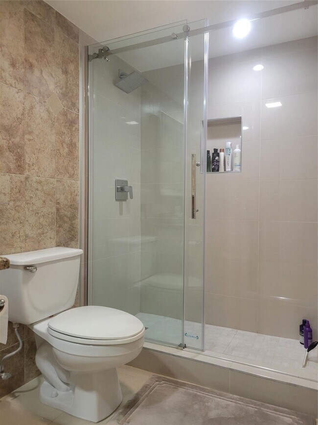 Building Photo - 19370 Collins Ave