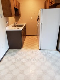 Building Photo - 408 McKay Ave N