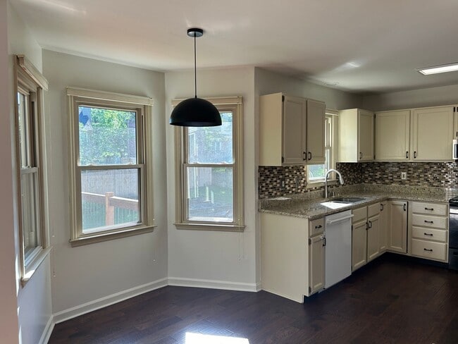 Building Photo - 4 Bedrooms with Finished Basement and Bonu...