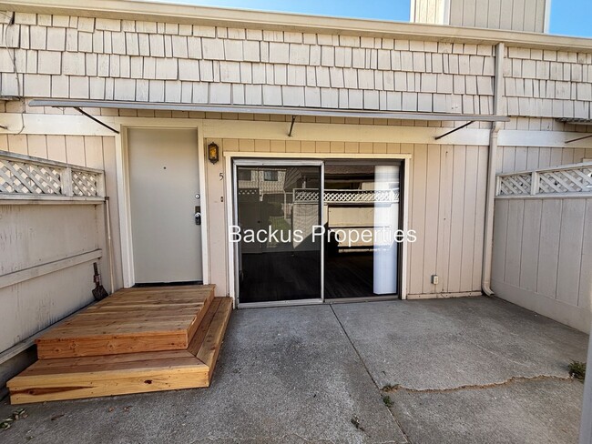 Primary Photo - Private townhuse style condo facing grassy...