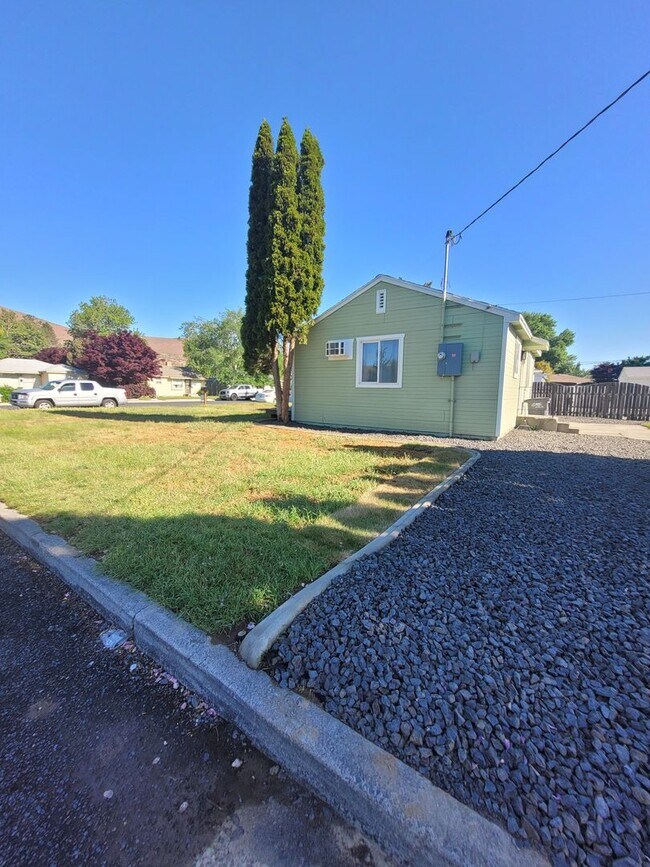 Building Photo - Free May rent with 1 Year Lease - Fully Remodeled with Garage & Yard Care Included