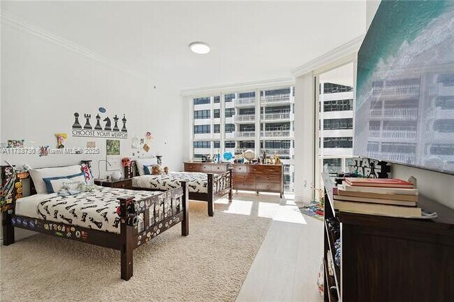Building Photo - 10225 Collins Ave