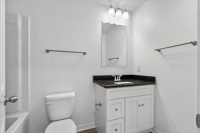 Building Photo - Spacious 4-Bedroom Townhome