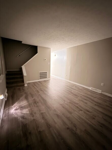 Living Room Looking to Stairs - 3231 Island Rd