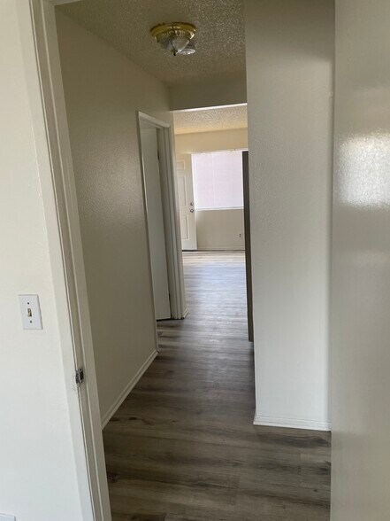 Hall leading to 2 other Bedrooms and Full Bath - 1515 W 84th Pl