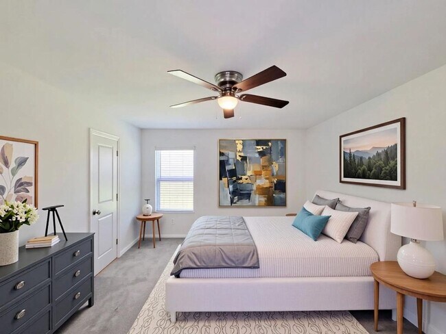 Building Photo - This single-story home has a comfortable layout with three bedrooms and a living area all on one ...