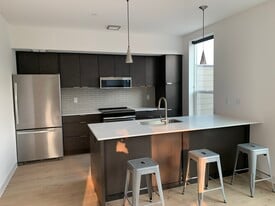 kitchen is fully stocked with dishes, pans, etc. - 718 W Babcock St