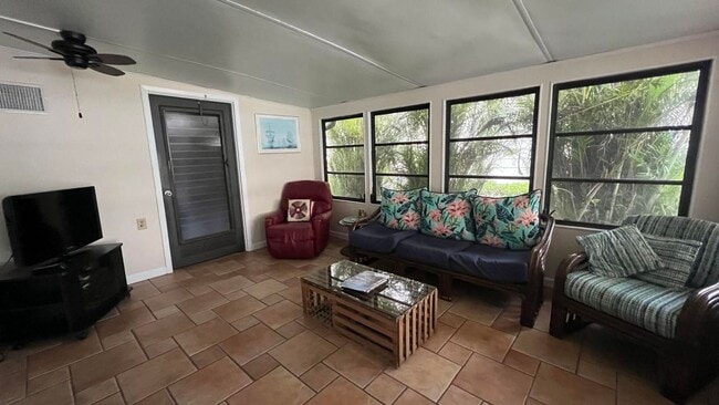 Building Photo - Large 2 Bedroom/2 Bath PALM HARBOR Manufactured Home in Cambridge 55+ Community In Hobe Sound Flo...