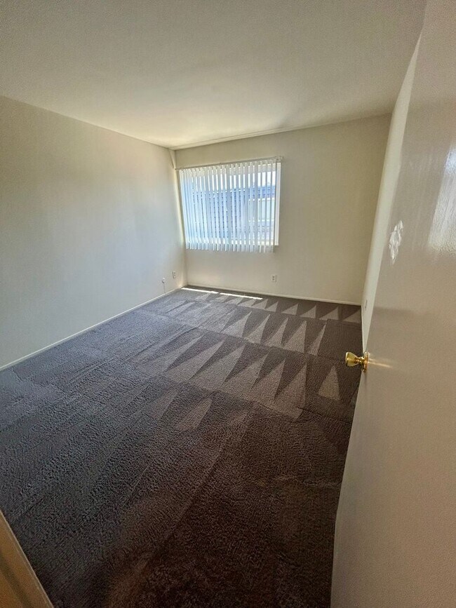 Building Photo - 14205-14211 Doolittle Dr.