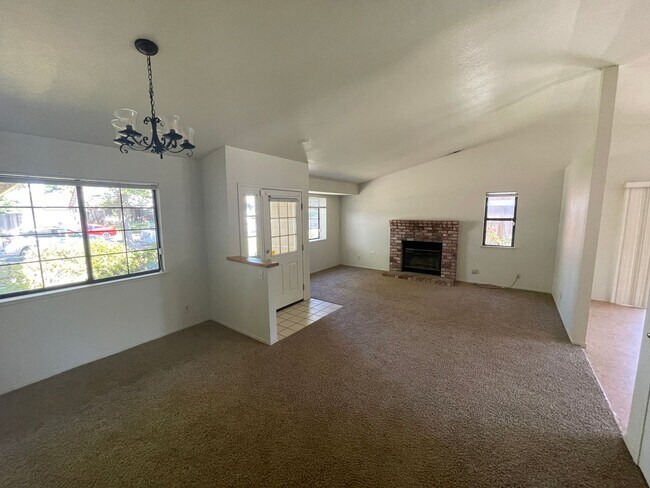 Building Photo - Central Chico, 3/2 fenced yard, 2 car garage, Gardener included, Solar, Fireplace, Craftsman Pergola