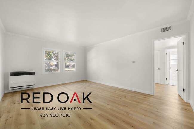 Building Photo - 8752-8754 Belford Ave