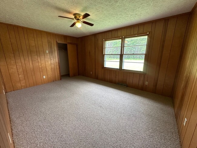 Building Photo - Spacious brick house with a caport and unf...