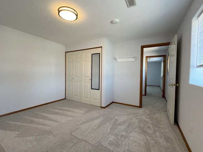 Building Photo - Spacious 4-Bedroom, 2.5-Bathroom Home with...